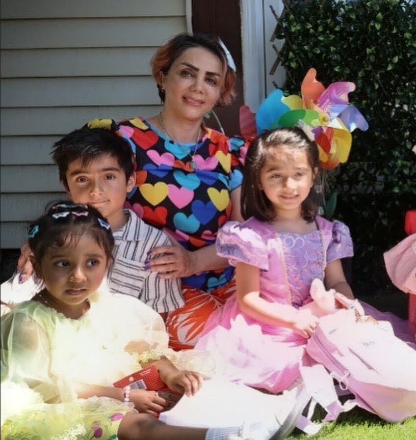 Happy children and educator at Aria Daycare